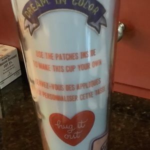 Starbucks cup with patches. 24 oz